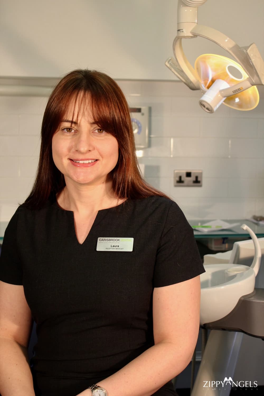Corporate headshot of smiling woman