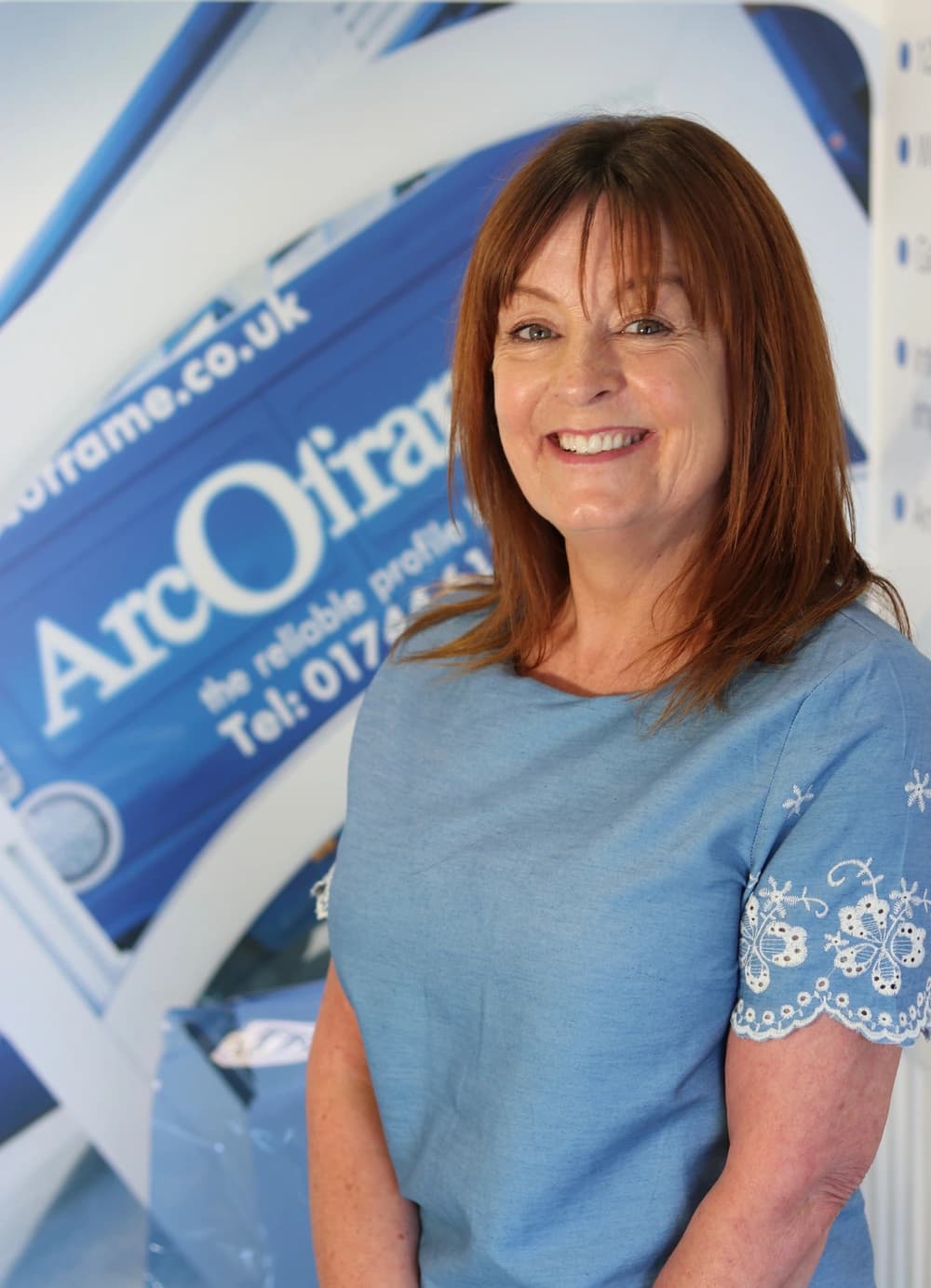 Corporate headshot of smiling woman