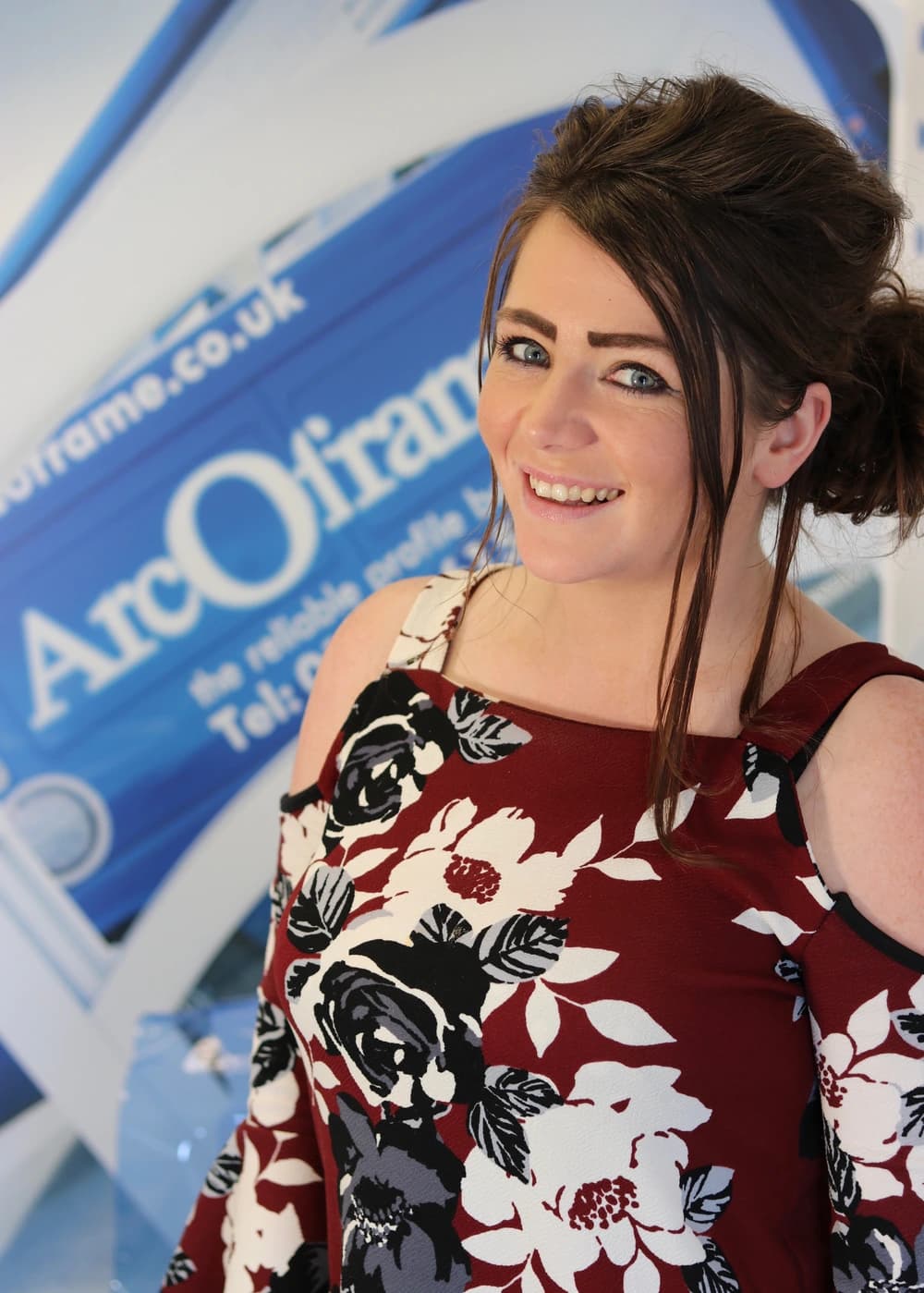 Corporate headshot of smiling woman
